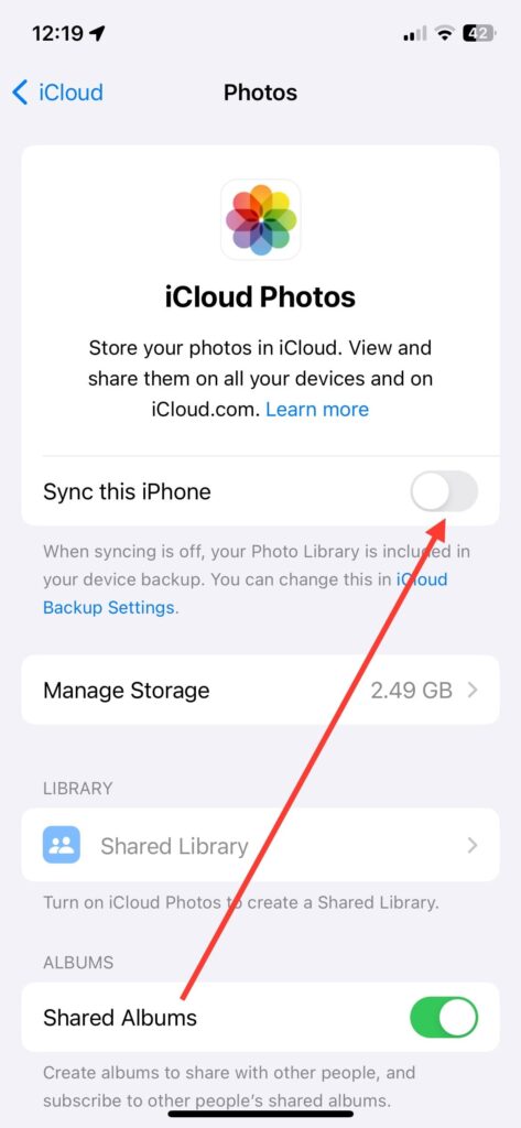 enable the toggle for Sync this iPhone